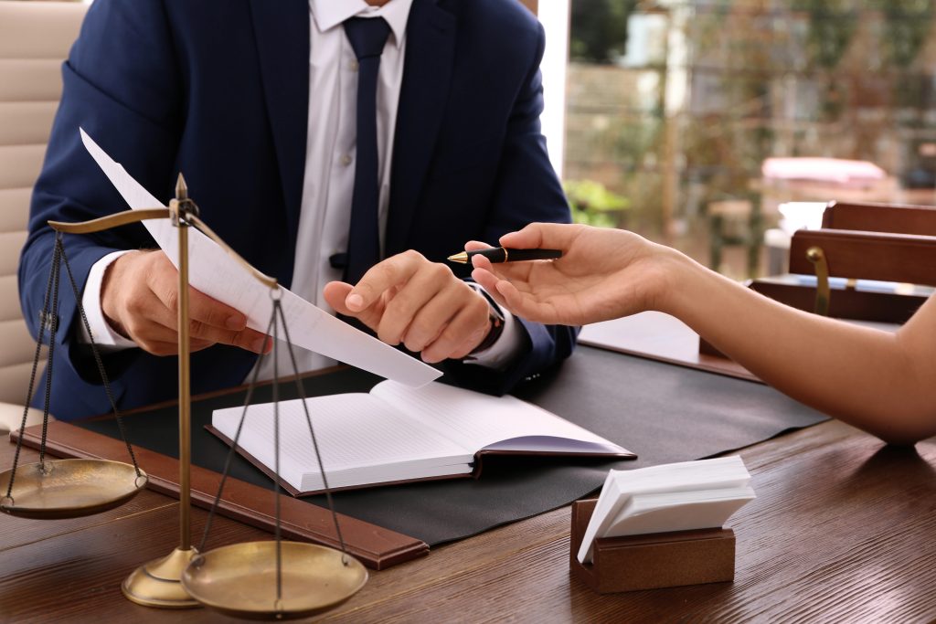 Attorney and client discussing a personal injury case