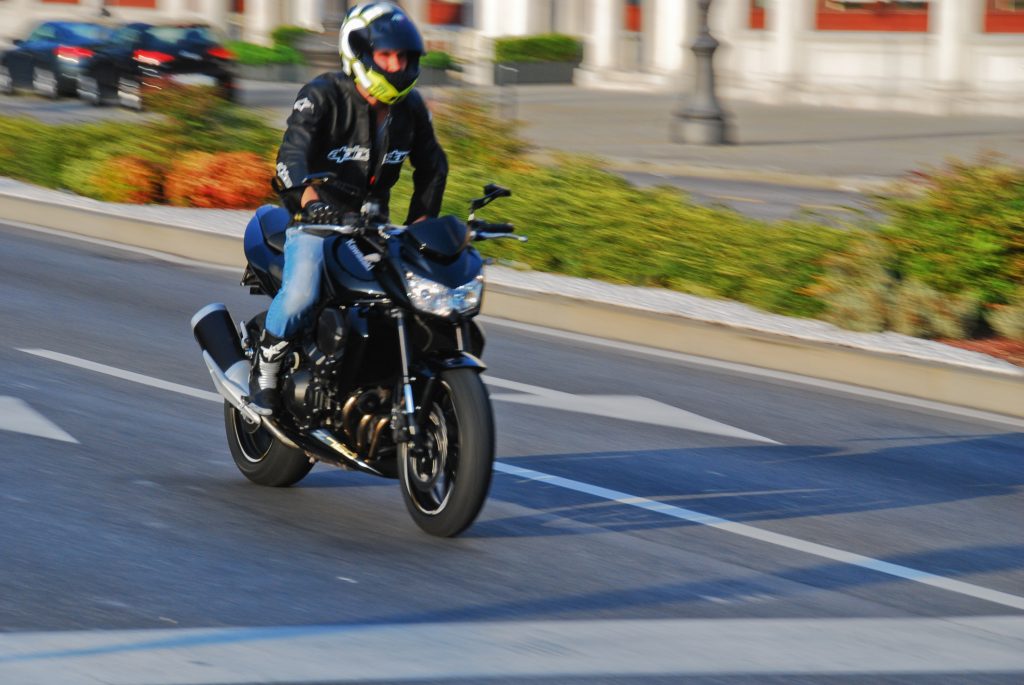 Motorcyclist doing lane splitting
